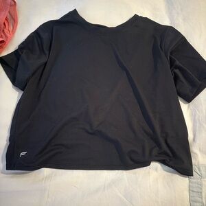Fabletics black top. Cut out back. Black. Size XS